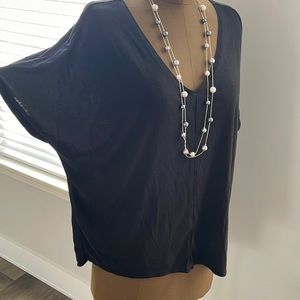 White and black top.